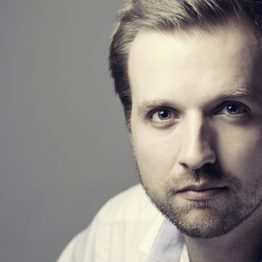 George Humphreys image (Light haired man in a white shirt)