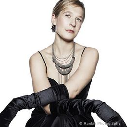 Laura Mitchell (short blonde haired female)