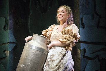 The title charactar smiles in G&S's Patience