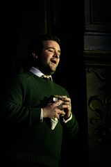 A tenor performs from the dress circle at Hackney Empire in the St John Passion