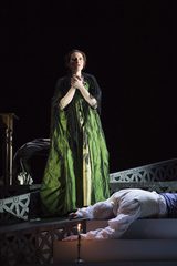 Tosca standing over Scarpia